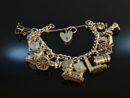England around 1965! Beautiful charm bracelet 16 charms...