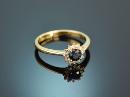 Blaues Funkeln! Klassischer Ring mit Saphir und Diamanten Gold 750
