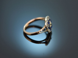 England around 1900! Daisy ring with diamonds and sapphire blue paste in 375 gold