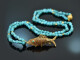 Around 1970! Filigree fish pendant with long turquoise chain, gold-plated silver