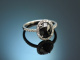 Elegant ring with large black diamond of 2.3 carats and diamonds in 750 white gold