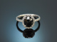 Elegant ring with large black diamond of 2.3 carats and diamonds in 750 white gold