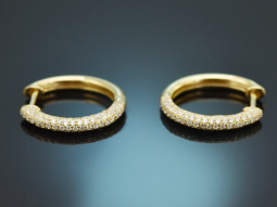 Oval hoop earrings with diamonds 0.74 carats, made of 750...