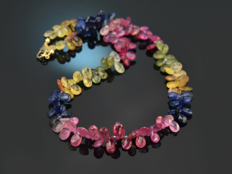 Beautiful necklace made of colorful sapphire drops in a color gradient with a clasp made of 14k gold