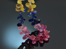 Beautiful necklace made of colorful sapphire drops in a...