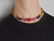 Beautiful necklace made of colorful sapphire drops in a color gradient with a clasp made of 14k gold